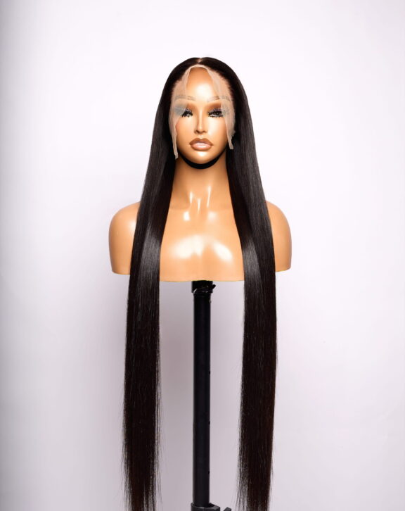 Ultra-smooth, tangle-free 100% human hair with invisible lace, pre-plucked hairline, and 180% density. Lays flat, swings heavy, lasts for years.